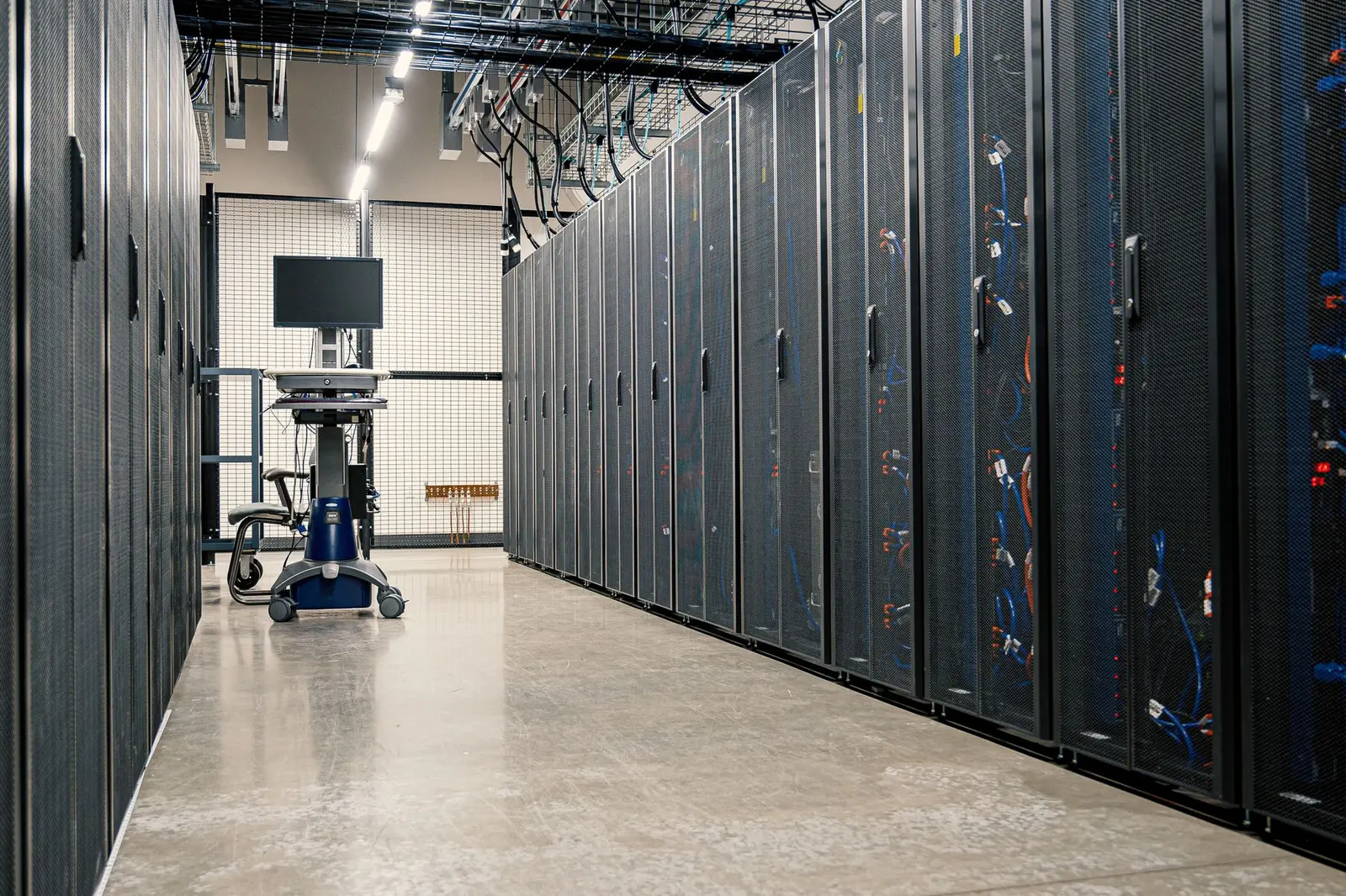 Rows of server cabinets in a data center